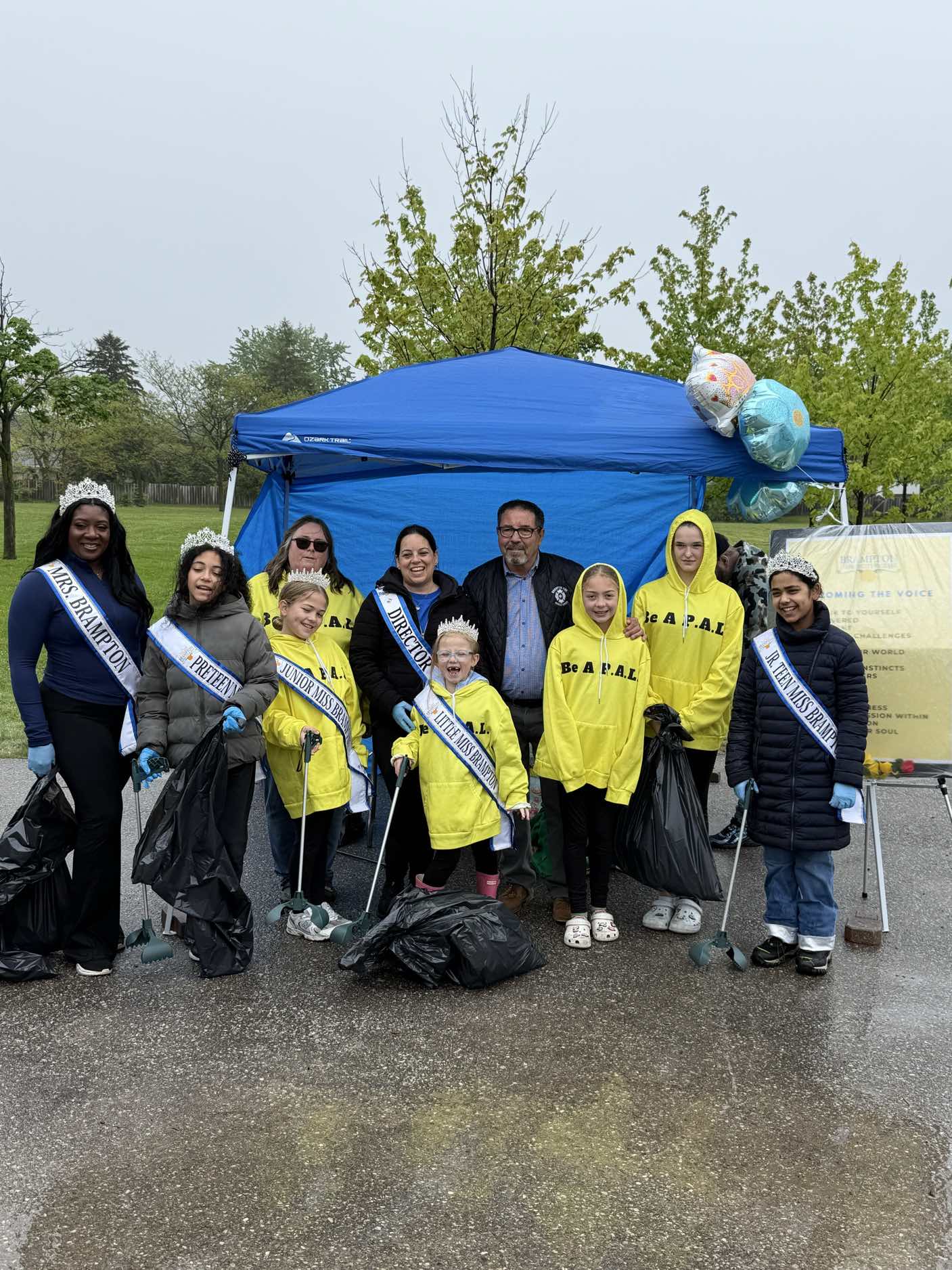 Pat Fortini with youth volunteers at a community clean-up event
