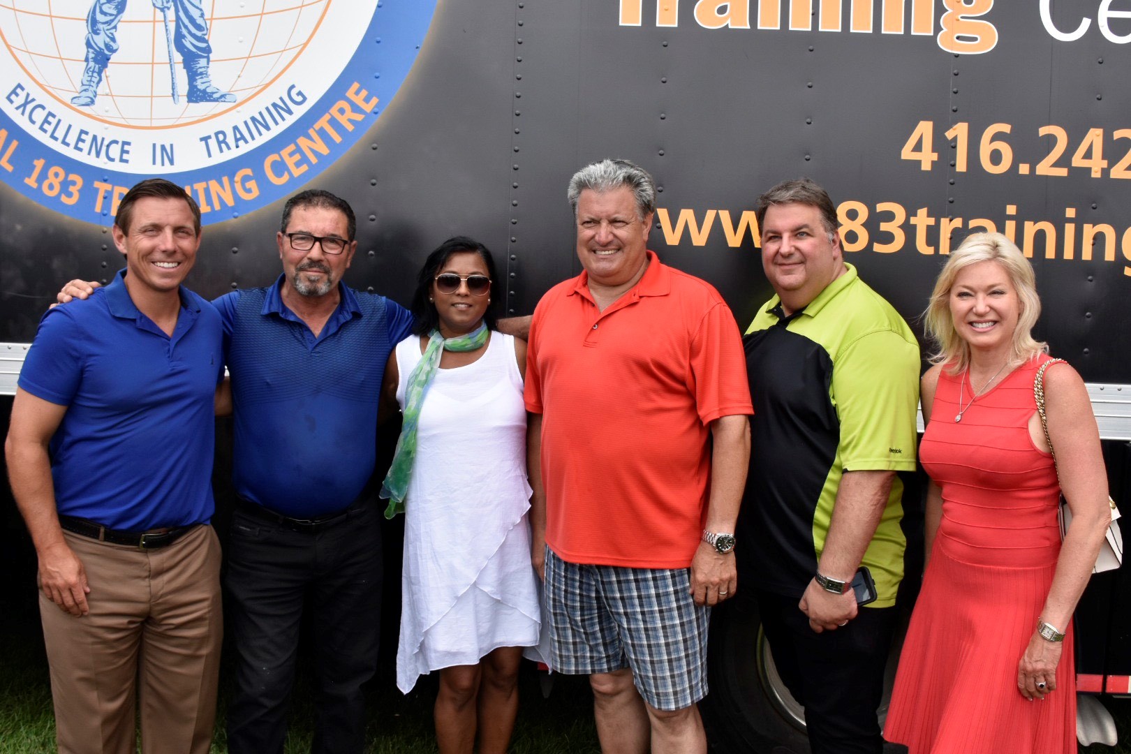 Pat Fortini with community members and officials at a Local 183 Training Centre event